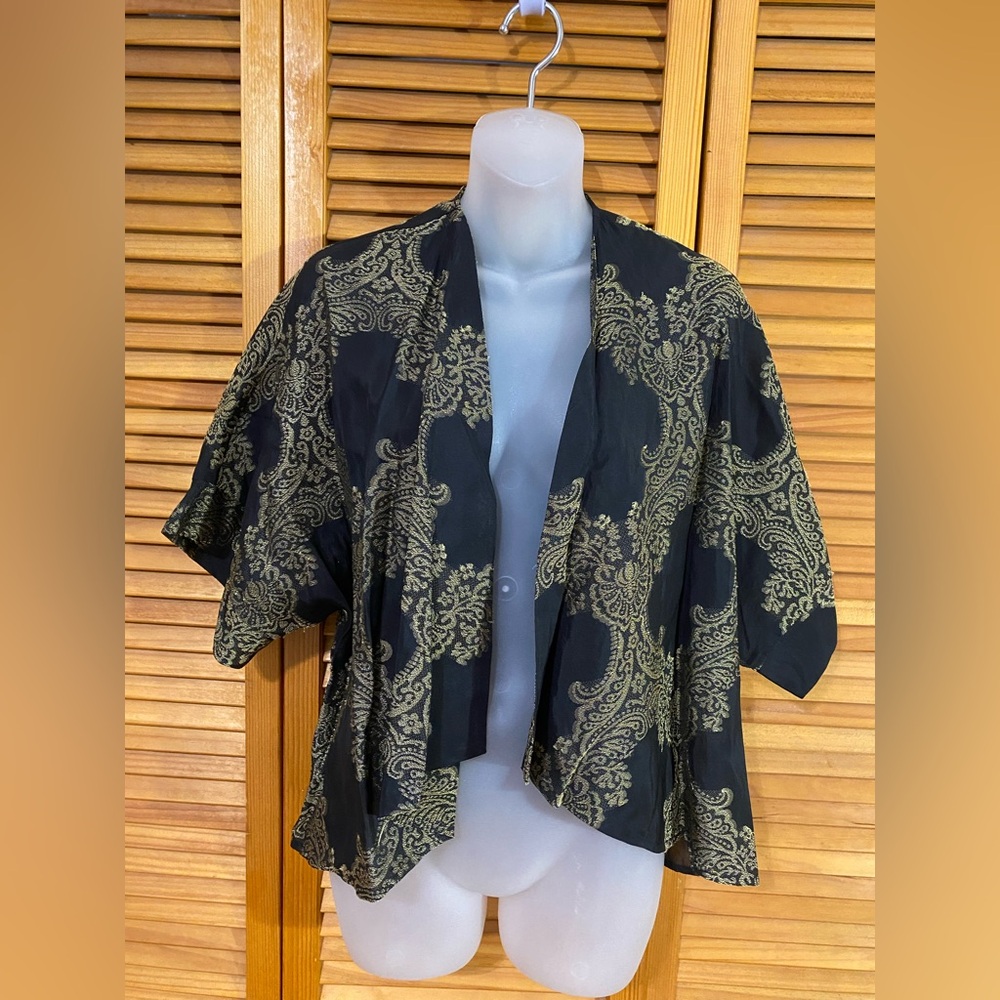 Black and gold top by Pins N’ Needles